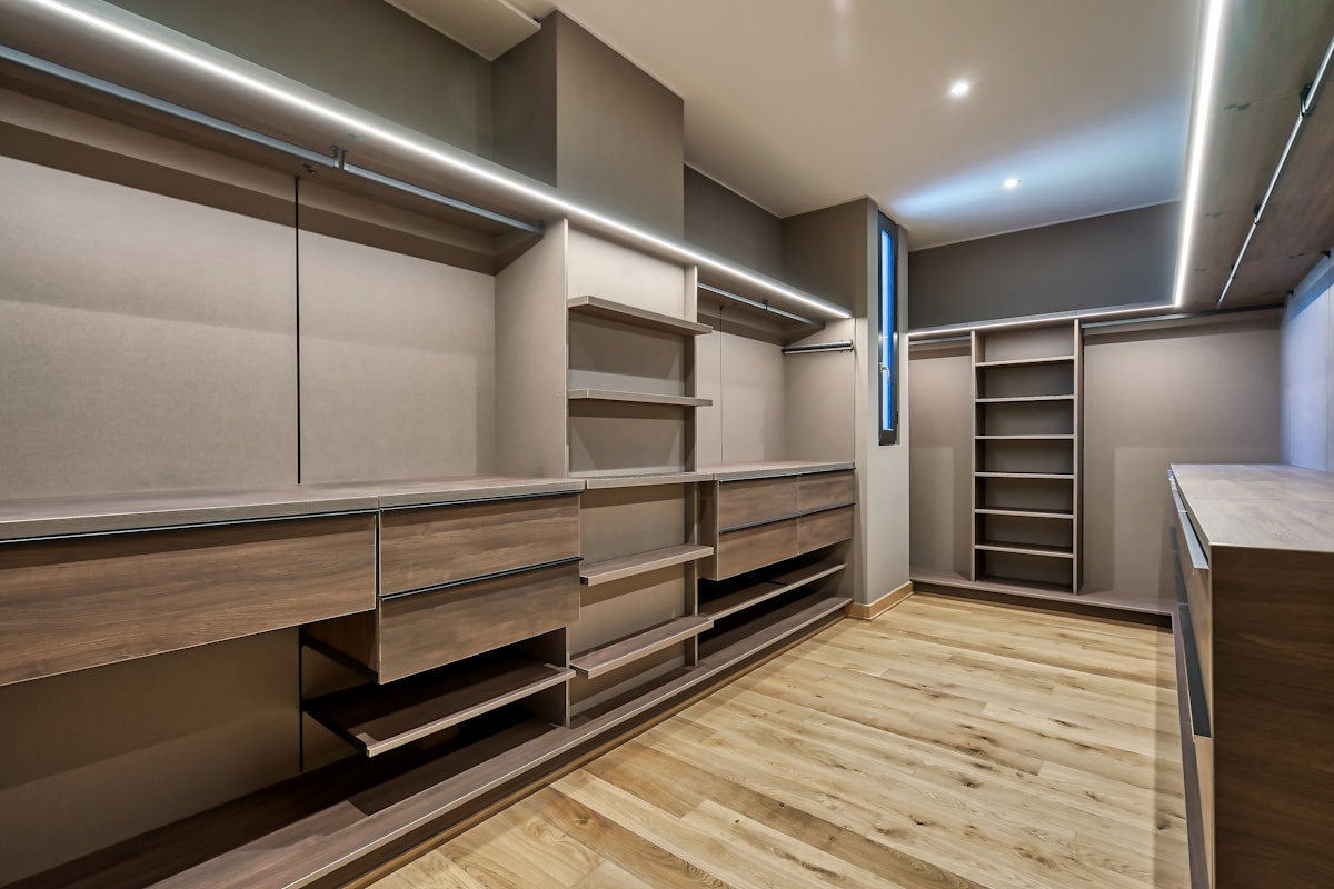 Minimal light oak wardrobe with handleless drawers